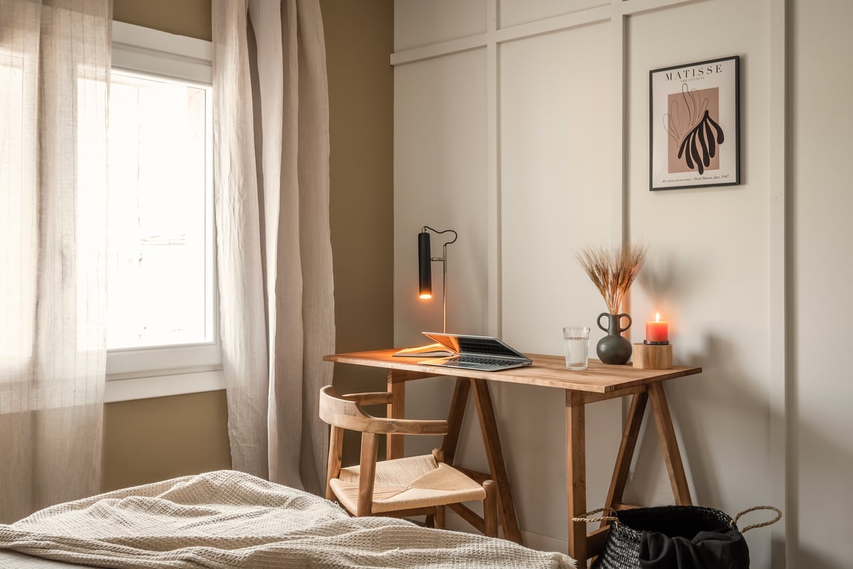 a desk and chair in a bedroom with a window. Organic interior design, modern interior design, Matisse wall art. Zara home decoration, Soho Home decoration. Interior Styling. Noelle baartmans. Kelly weartsler. Vt wonen. By Aptó interiors. in Barcelona
